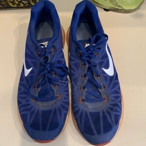 Men’s  11.5 Nike Running shoes. Used fair condition. Blue/Orange.